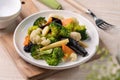 Homemade fresh boiled vegetables with cauliflower, broccoli, black fungus and baby corn