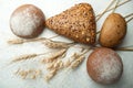 Homemade fresh bread and wheat on a white rustic background Royalty Free Stock Photo