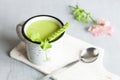 Homemade fresh green pea cream soup with pea sprouts and flowers Royalty Free Stock Photo