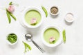 Homemade fresh green pea cream soup with pea sprouts and flowers Royalty Free Stock Photo