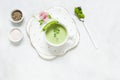 Homemade fresh green pea cream soup with pea sprouts and flowers Royalty Free Stock Photo