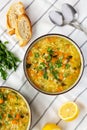 Homemade fresh lemon rice soup in a bowl, top view. Flat lay, overhead, from above Royalty Free Stock Photo