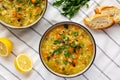 Homemade fresh lemon rice soup in a bowl, top view. Flat lay, overhead, from above Royalty Free Stock Photo