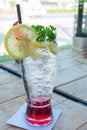 Homemade fresh pink lemonade with lemon, lime and strawberries Royalty Free Stock Photo