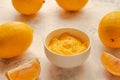 Homemade fresh pudding or tangy lemon curd in a white bowl.Selective focus