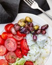 Homemade fresh vegetable salad with dressing. Background idea. Royalty Free Stock Photo