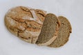 Homemade freshly baked rye and wheat loaf of bread on white background. Concept of health and huger. Organic Food concept Royalty Free Stock Photo