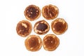 Homemade pancakes on a white background, top view