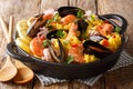 Homemade freshly prepared paella with king prawns, mussels, fish