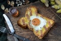 Homemade fried egg in a hole Bacon and Cheese toast serve with Honey. Sandwiches for breakfast Royalty Free Stock Photo