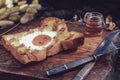 Homemade fried egg in a hole Bacon and Cheese toast serve with Honey. Sandwiches for breakfast Royalty Free Stock Photo