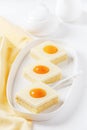 Homemade `Fried eggs` cake with apricot, pudding and sour cream. Royalty Free Stock Photo