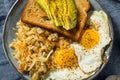 Homemade Fried Shredded Hashbrowns and Eggs Royalty Free Stock Photo