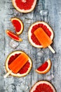 Homemade frozen grapefruit natural juice popsicles.