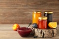 Homemade fruit jam in the jar on grey background. Top view Royalty Free Stock Photo