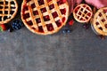 Homemade fruit pie top border over a dark background Royalty Free Stock Photo