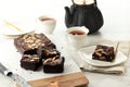Homemade Fudgy Chocolate Brownies on White Table Royalty Free Stock Photo