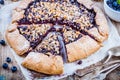 Homemade galette with blueberries and walnuts