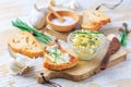 Homemade garlic butter with chives and fresh roasted baguette with salt Royalty Free Stock Photo