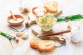 Homemade garlic butter with herbs and chives and fresh roasted baguette Royalty Free Stock Photo