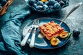 Homemade German plum cake (Zwetschgenkuchen) with yeast dough and crumbles Royalty Free Stock Photo