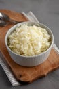 Homemade German Sauerkraut in a Bowl on a gray background, side view
