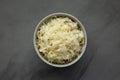 Homemade German Sauerkraut in a Bowl on a gray background, top view