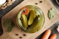 Homemade gherkins or pickled cucumber in a glass jar, top view Royalty Free Stock Photo