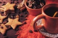 Homemade ginger cookies, cup of tea with lemon, dates, cinnamon with raisins Royalty Free Stock Photo