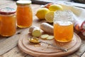 Homemade ginger and lemon jam on wooden background. Natural products to support the immune system in winter. Herbal medicine, heal