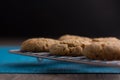 Homemade Ginger and Oats biscuits on a metal cooling rack