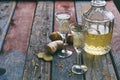 Homemade ginger tincture or ale on wooden background. Rustic style. Spice yellow liqueur in a glass. Alcohol drink. Royalty Free Stock Photo
