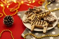 Homemade gingerbread Christmas cookies on white plate, closeup view. Royalty Free Stock Photo