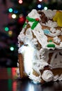 Homemade gingerbread Christmas house with night bokeh background Royalty Free Stock Photo