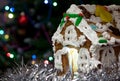 Homemade gingerbread Christmas house with night bokeh background Royalty Free Stock Photo