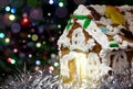 Homemade gingerbread Christmas house with night colorful bokeh Royalty Free Stock Photo