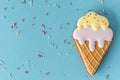 Homemade gingerbread cookie in the shape of ice cream with pastel colors icing. Vintage stylish birthday pastry background. Free