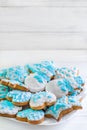Homemade gingerbread cookies. Christmas gingerbread white blue. Gingerbread man, snowman, heart, star, Christmas tree, snowflake. Royalty Free Stock Photo