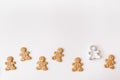 Homemade gingerbread cookies on white background. Christmas winter new year composition.