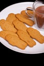 Homemade gingerbread men. Tea and ginger cookie biscuits comfort food Royalty Free Stock Photo
