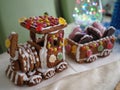 Homemade gingerbread Northern Express Christmas decoration with children