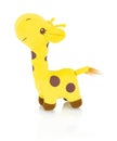 Homemade giraffe plushie doll isolated on white background with shadow reflection. Yellow giraffe plush stuffed puppet on white. Royalty Free Stock Photo