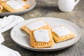 Homemade glazed pop tarts on a plate. American pastry Royalty Free Stock Photo