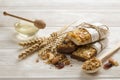 Homemade gluten free granola bars on wooden background.