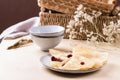 Homemade gluten free rice crepes or pancakes served with dried cranberries Royalty Free Stock Photo