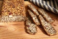 Homemade glutenfree bread with hazelnut and flax seeds on a wooden Board background close-up. Food for diet and health