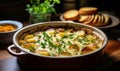 Homemade Golden Brown Potato Gratin in a White Ceramic Dish on a Wooden Table by the Window Freshly Baked and Garnished with Herbs Royalty Free Stock Photo