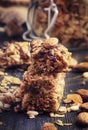 Homemade granola energy bar with raisins and almonds, selective focus Royalty Free Stock Photo