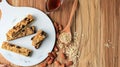 Homemade granola energy bars with figs, oatmeal, almond, dry cranberry, chia and sunflower seeds, healthy snack Royalty Free Stock Photo