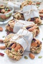 Homemade granola energy bars with figs, oatmeal, almond, dry cranberry and pumpkin seeds, vertical Royalty Free Stock Photo